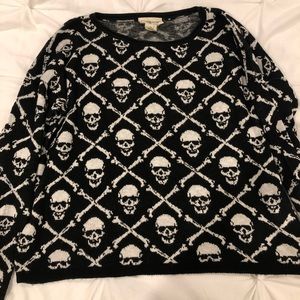 In GUC, awesome vintage skull sweater.